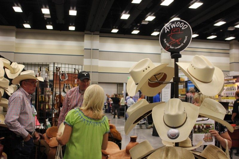 Cowboy hats for sale at an indoor expo