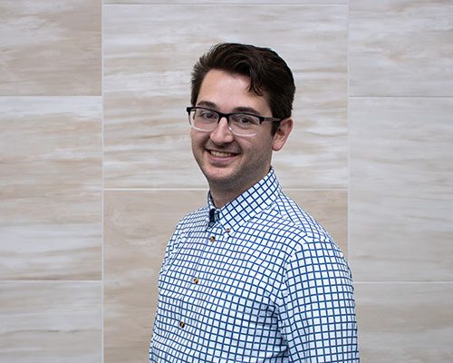 man in blue gingham shirt