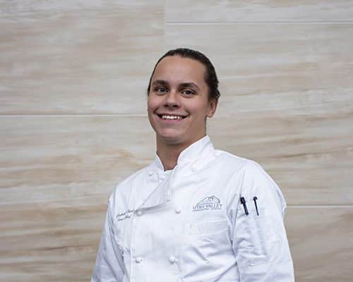 man in chef's coat