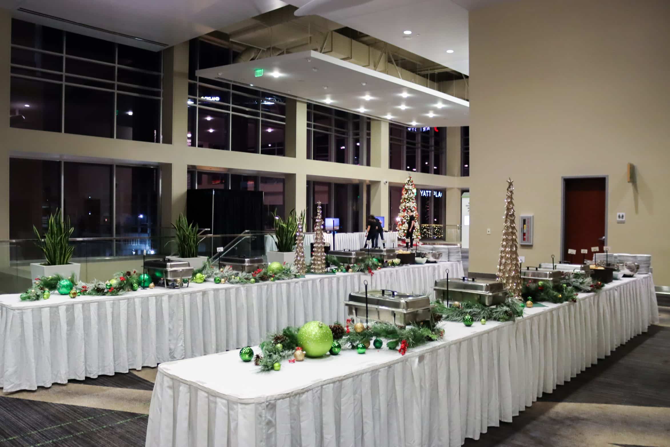 A banquet hall decorated for Christmas