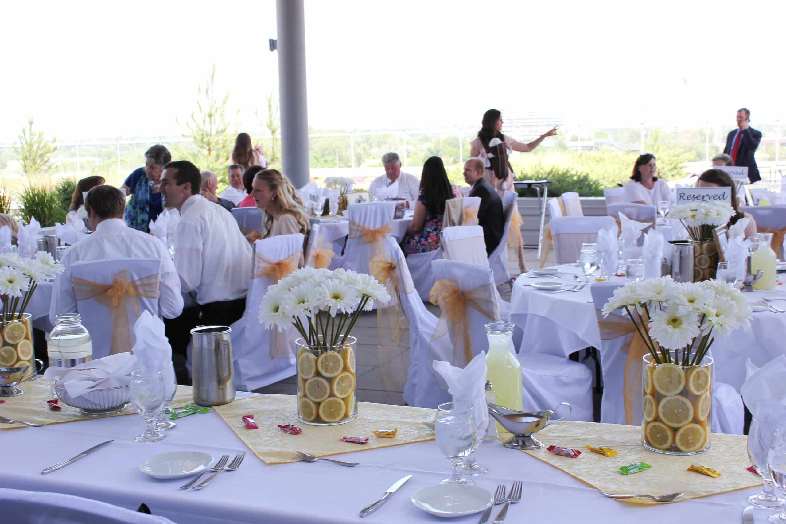 Outdoor event setting with decorated tables